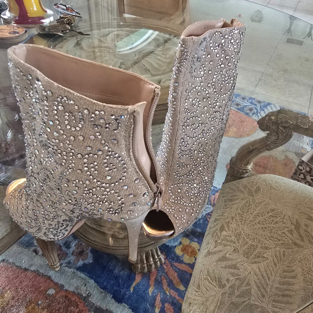 four pairs of booties/ ll sent to you for 200.00 great deal